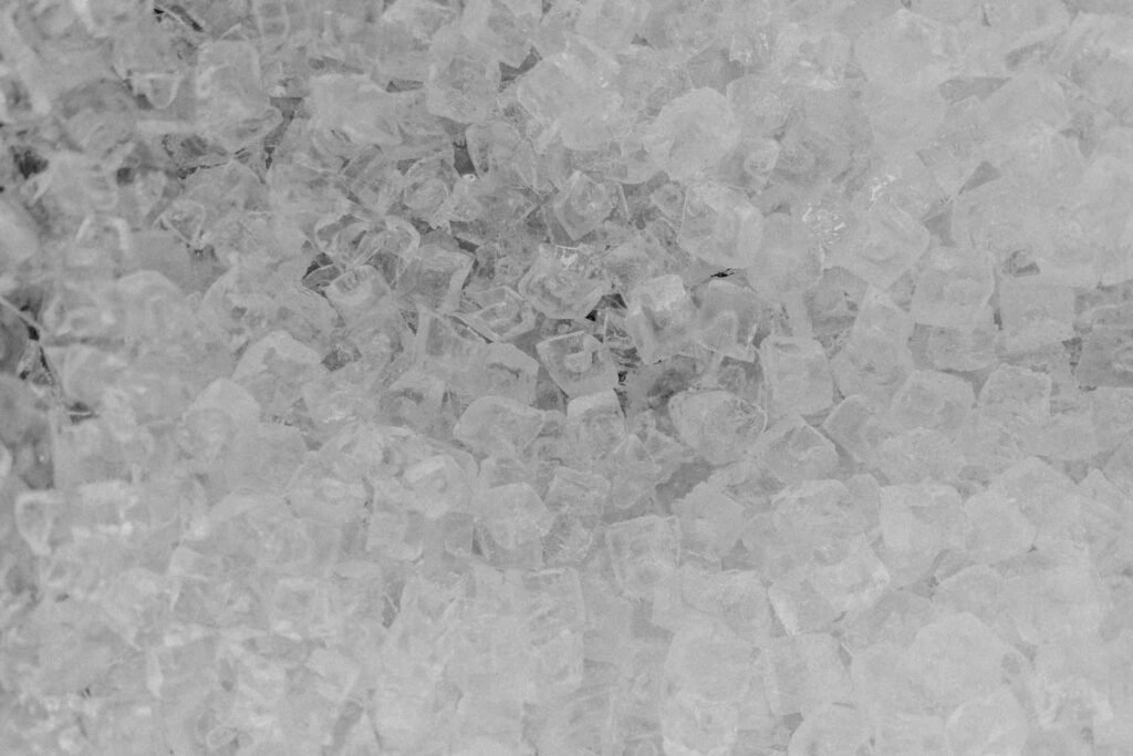 A lot of ice cubes on top of each other.